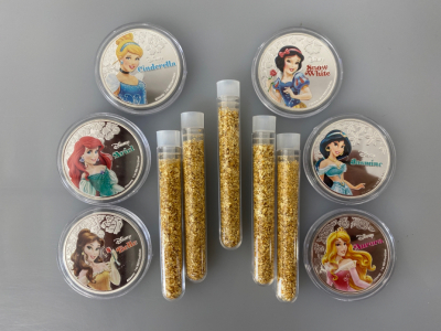 Set of (6) Disney Collectible Silver Plated Coins and (5) Bottles of Gold Flake/ Leaf Gold