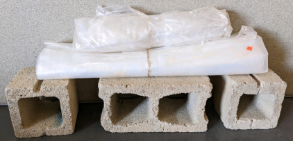 Plastic Sheeting, Cinder Blocks
