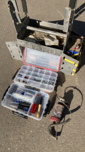 Metal toolbox with some tools, parts, a 12 volt starter and more