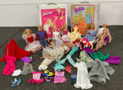 Barbies And Fashion Trunks With Clothes