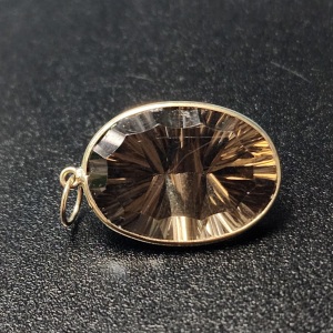 $740 10K Smokey Quartz(9ct) Pendant