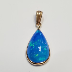 $600 14K Treated Opal(3.5ct) Pendant
