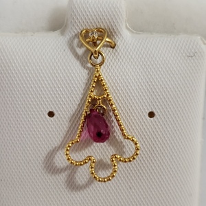 $600 14K Gemstone Pendant