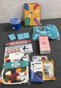MPok&eacute;mon Card Binder. (3) 5 Pair of Ear Plugs, Ice Cube Roller and More
