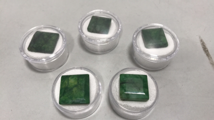 (5) Emerald Cut and Faceted Brazilian Emeralds between 19.3ct. and 25.4ct.