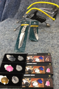 (2) Wood River Blades (3) Folding Knives (1) Barret Diablo Slingshot (3) Pocket Knives