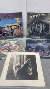 Vinyl Records by AC/DC, Aerosmith and Other Artists