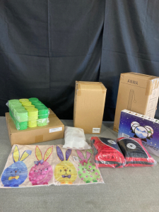 Box of Amazon Items containing: Zip Lock Bag Organizer, scratching Post, First aid Kit, Sand Art, Streamers, Easter Placemats, Silicon Cups, Plus More