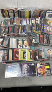 CDs including Elvis Presley, Marilyn Monroe, Willie Nelson, Rock N Roll Hits of the &lsquo;50s and many more