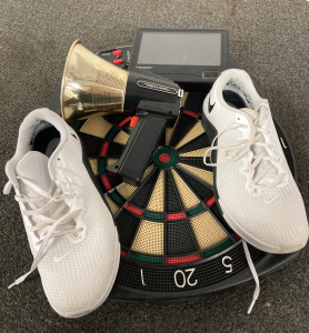 Dartboard, Horn, Nike Shoes, And Eviant Portable screen