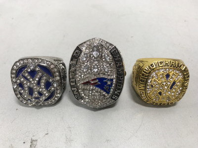 (1) 2000 New York Yankees World Championship Ring for Derek Jeter, (1) 2009 New York Yankees World Championship Ring for Derek Jeter, (1) 2018 New England Patriots Super Bowl LIII Ring for Tom Brady