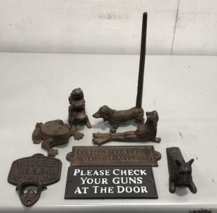 Cast Iron Items… 3 frog paper weight, Lidded frog dish, Dog door stop, Frog door stop, Dog toilet paper holder, Cast iron signs… Free Beer tomorrow bottle opener, On this site in 1897 nothing happened, Please check your guns at the door.