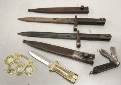 (2) WWII M38 Mauser Bayonet w/ scabbard, WWII Royal Italian Military Utility Knife, German Paratrooper Scissor Knife, Brass Toned paper weight w/ belt buckle attachment
