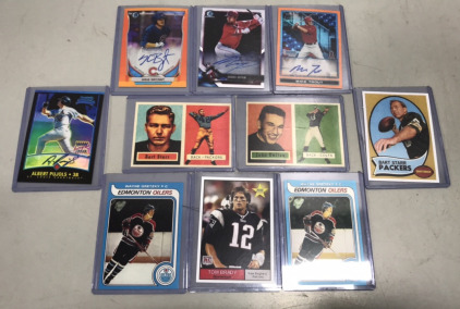 (10) Collectible Sports Cards- (1) Tom Brady Rookie RC Card, (2) Bart Starr, Johnny Unitas, (2) Wayne Gretzky, Shohei Ohtani, Mike Trout, Albert Pujols, and Kris Bryant.