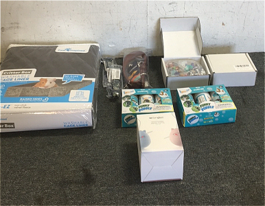 (1) Critter Box 47&rdquo; x 24&rdquo; Washable Cage Liner (1) Gomyhom Ninja Tumbler Electric Cat Toy (2) Iwanga Pet Funny bubble toys (2) 12- Piece Dog Patrol Toy Figure Sets (1) Pawmob Dog Collar (2)Rhea Rose Cat Collars