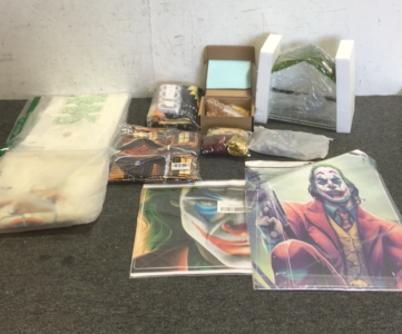 (2) Joker Themed PlayStation 5 Skins (1) Large Stencil Set (1) Grassland Clear Bird House (1) Bag Of Assorted Balloons (3) Wood Corner Wall Hooks (1) Fall Themed Shower Curtains