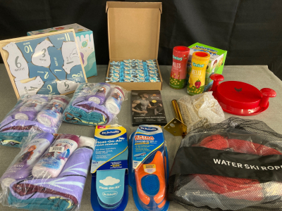 Assorted Amazon Consumer Goods: Frozen Bath Sets, Childrens Puzzle, Water Ski Rope, Celebration Baby Bottles, Timios Melts, Chick Blast, Water Spray Toy, Indeemax Sport Protection, Plus More