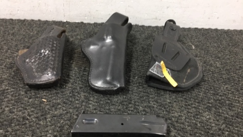 3 Pistol Holsters and Pistol Clip