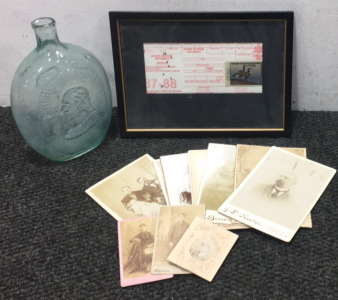 Bird hunting license, glass bottle and vintage photos
