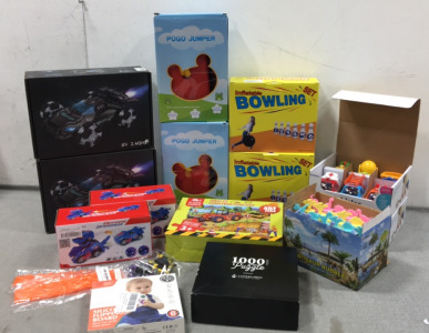 (2) R/C Cars, (2) Inflatable Bowling Sets, (2) Deform Dinosaur Cars, (2) Set of 6 Toy Cars, (2) Pogo Jumpers and more