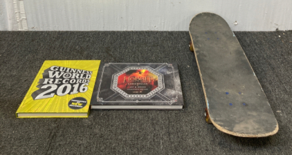 Skateboard And Books