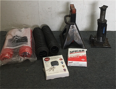 (2)Pairs Of Explorer ProComp Shock Covers (1) Jack Stand (1) Bottle Jack (1) Spicer Universal Joint Kit (1) Tagit car Keys Tracking System