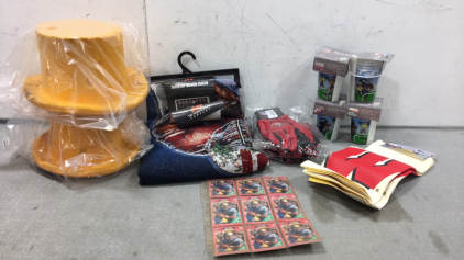 Nebraska Huskers Blanket, (2) Cheese Heads, (3) 49ers Gloves, (4) Set of Kids Seahawks Cups, (2) Chamois, Troy Aikman Cards