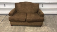 Brown love seat