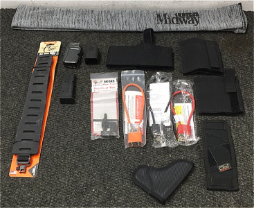 (4) Gun Locks (2) Clips (1) Rifle Sock (1) Claw Sling