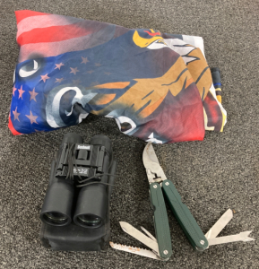 Bushnell Binoculars, Leatherman Mini Tool, And Flag