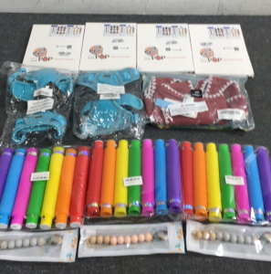 (3) Pack Of Pop Tubes, (4) Cutie Pop Diamond Stickers, (2) Pet Harnesses And More