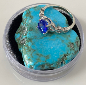 80.90 Ct. Turquoise Gemstone Cabochon and Size 6 Blue Sapphire Ring