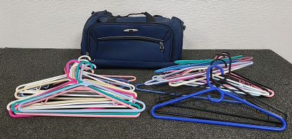 Suitcase and Plastic Hangers