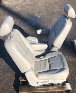 (2) Gray Leather Car Seats