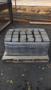 Pallet of (24) Charcoal Kanaka Wall Topper Stones