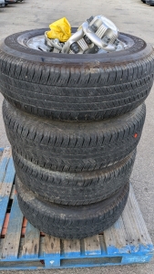 Bridgestone P265/70R17 1135 Tires w/Chevy Caps & Lug Nuts