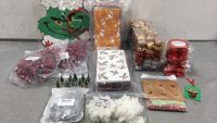 Christmas Items: (10) Rolls of Red Ribbon, Gift Tags, (4) Box of Heart Ornamenta, Goody Bags, Grinch Hanging Decor, Snowflake Ornaments, Fake Holly, Ornament Hooks and Ties, Mini Trees, Paper Reindeer Ornament