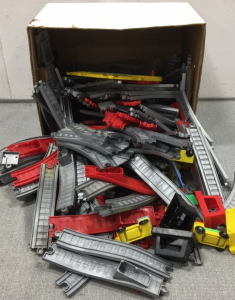 Box of Plastic Toy Train Set