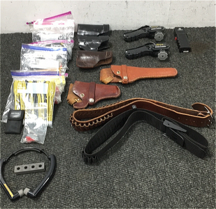 (1) Box of Ammo Belts, Holsters, Locks, Clips, much more