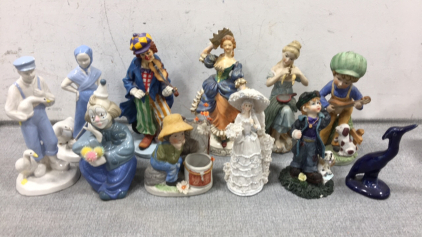 (11) Various Figurines: (2) Clowns, (3) Women, (3) Boys, (1) Dutch Boy, (1) Dutch Girl, (1) Bird