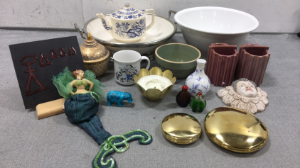 (1) Over and Back YellowWare Bowl, (2) Large Bowls, (2) Urban Outfitters 2-Sided Holders, Ceramic Decorative Tea Pot, “Working Woman” Mug, Decorative Trinket Dish, Metal Candle Holder, Small Wedgwood Vase, (2) Gold Trinket Dishes and more