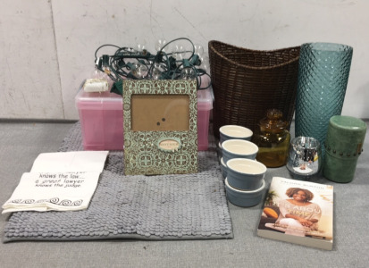 Wicker Trash Bin, Blue Vase, Silver Candle Holder, Glass Jar, Globe String Lights, (6) Small Ramekins, Bath Mat, “Mother” Frame, Pink Storage Bin, Valorie Burton Book