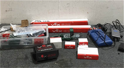 (1) Vex Clawbot Claw With Motor (1) Vex 8-Battery Charger (1) Vex Arm Cortex-Based Microcontroller (2) Vex Optical Shaft Encoder (1) Bin Of Various Robot Components (1) Motor 393 Integrated Module (1) Vex Moyor controller 29 (2) Linear Motion Kits