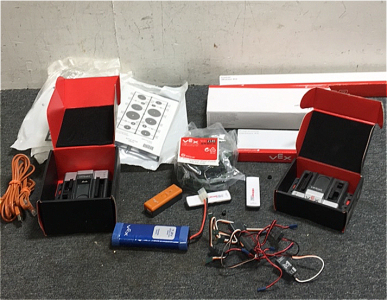 (2) Vex Edr Vex Arm Cortex-Based Microcontroller (2) 4” Omni Directional Tires (4) Vex Front Gear Kits (1) Vex Programming Hardware (1) Vex 8-bay Mart Battery Charger (1) vex Programming Adapter (2) Vex Wireless Usb Adapters (1) Vex 7.2v Power Pack (6) Ve