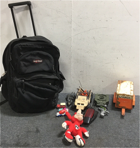 (1) Vintage Metal Uhaul Toy (3) Vintage GI Joe Toys (1) 1988 Domino’s Plush “Noid” Doll (3) Hot Wheels Cars (1) Eastpack backpack With Wheels