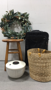 Hartmann Suitcase, Wood Stool, Wicker Storage Basket, OXO Salad Spinner, Fake Floral Wreath