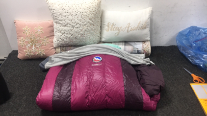 (1) Area Rug - (1) Sleeping Bag - (3) Throw Pillows