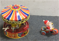 (1) Antique Tin Merry-Go-Round Wind Up Toy (1) Santa Clause Tricycle Tin Wind Up Toy