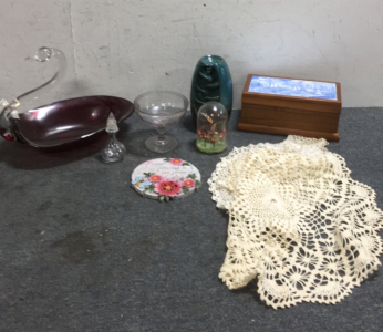 (1) Large Glass Swan Serving Tray (1) Small Porcelain Tabletop Water Fountain (4) Table Cloth Settings (1) Butterfly decoration (1) Small Glass Perfume bottle (1) 5” x10” Wooden Jewelry Box With Tile Lid