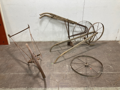 (3) Vintage Plows and (1) Antique Wheel